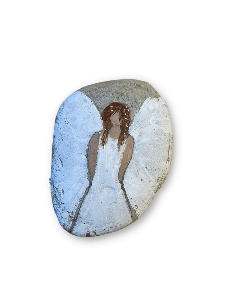 Weißer Engel auf einen Stein gemalt